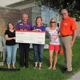 Members of Sheboygan Falls School Athletics and local Dodge representatives pose with a check following a Dodge Boosters Club Fundraiser event in June. Members of Sheboygan Falls School Athletics and local Dodge representatives pose with a check following a Dodge Boosters Club Fundraiser event in June.