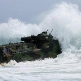 A U.S. Marine Corps amphibious assault vehicle charges through the surf at the Marine Corps Base Hawaii during the multi-national military exercise RIMPAC in Kaneohe, Hawaii, July 9, 2014.
CREDIT: REUTERS/HUGH GENTRY A U.S. Marine Corps amphibious assault vehicle charges through the surf at the Marine Corps Base Hawaii during the multi-national military exercise RIMPAC in Kaneohe, Hawaii, July 9, 2014.
CREDIT: REUTERS/HUGH GENTRY