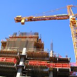 A construction crane. A construction crane.