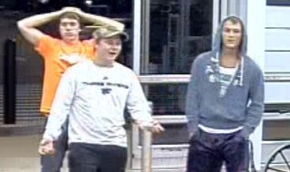 The suspects can be seen in this surveillance photo. The suspects can be seen in this surveillance photo.