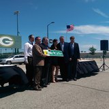 Mike McCarthy Way street sign unveiled during ceremony outside Green Bay Distillery in Ashwaubenon on July 23, 2014. (Photo Copyright Midwest Communications, Inc.) Mike McCarthy Way street sign unveiled during ceremony outside Green Bay Distillery in Ashwaubenon on July 23, 2014. (Photo Copyright Midwest Communications, Inc.)