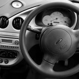 View of a steering wheel. View of a steering wheel.