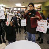  Scores of fast food workers and their supporters calling for a $15 minimum wage fill a McDonalds restaurant in Chelsea, Massachusetts today. CREDIT: REUTERS/BRIAN SNYDER