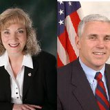 School Superintendent Glenda Ritz left Gov Mike Pence right