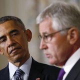 President Barack Obama listens to Defense Secretary Chuck Hagel after the president announced Hagel's resignation at the White House in Washington, November 24, 2014. Image/REUTERS.file