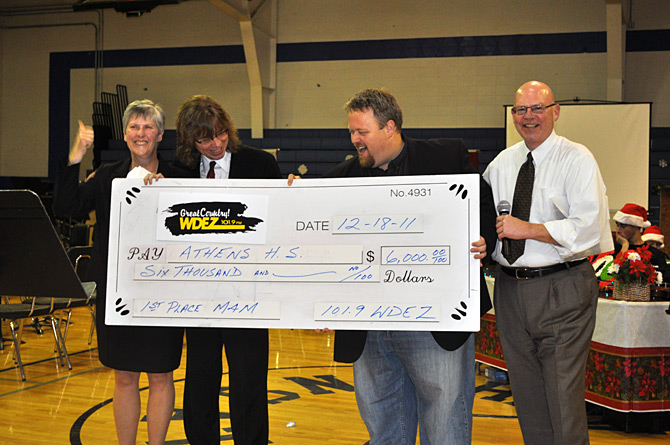 Athens High School presented with check.