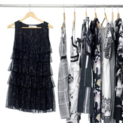 Black and white clothes on a rack