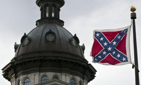 a confederate flag flies outside the south carolina state house